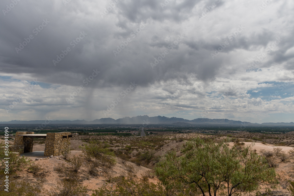 Scenic aerial Las Cruces vista under dramatic monsoonal sky, New Mexico 