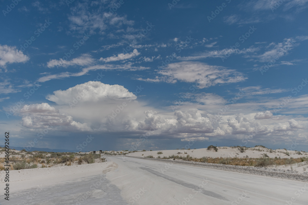 Beautiful gypsum dune vista at the White Sands National Park set against dramatic sky during the monsoon season, Southern New Mexico
