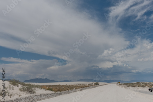 Beautiful gypsum dune vista at the White Sands National Park set against dramatic sky during the monsoon season  Southern New Mexico
