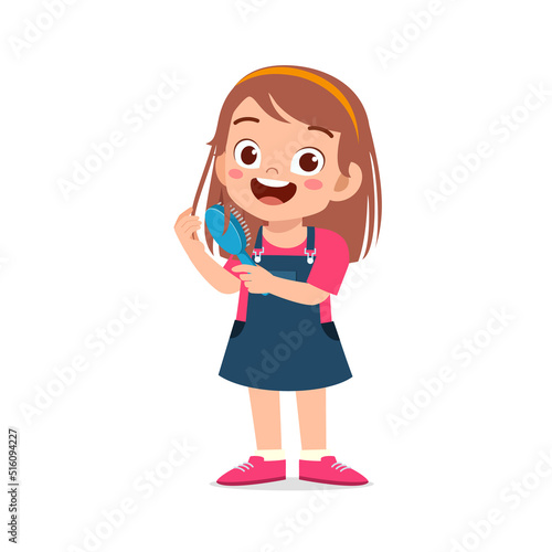 little kid comb hair with hair brush