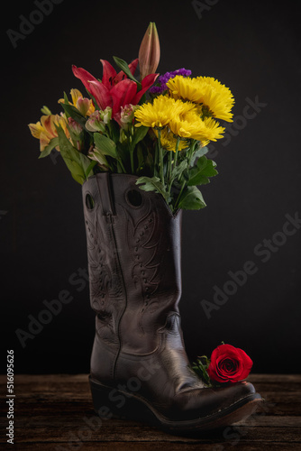 colorful flowers in a cowboy boot