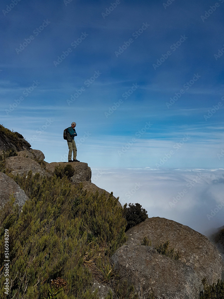 person on the top of mountain