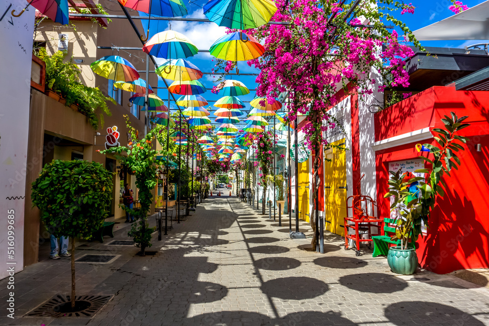 Central Park of Puerto Plata, Dominican Republic featuring ancient Cathedral, City Hall, multiple historical buildings and famous landmarks - July 2, 2022. - obrazy, fototapety, plakaty 