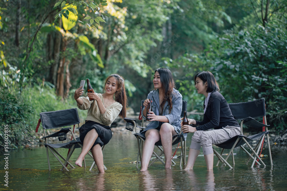 group of Asian girls enjoying a day at the during holiday camping group of Asian girls enjoying a day at the during holiday camping