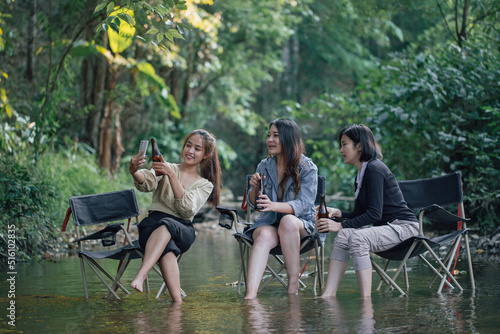 group of Asian girls enjoying a day at the during holiday camping