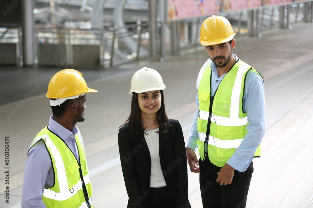 Architects and worker at the construction site. Architects and worker at the construction site.