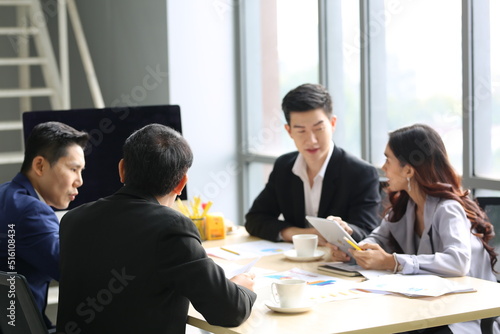 Young Asian business team people meeting in office