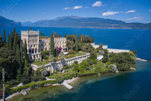 Wallpaper Mural Historic Venetian Neo-Gothic villa on Lake Garda. Panorama of Garda Island located on Lake Garda in Italy. Aerial view of the island of Garda. Torontodigital.ca