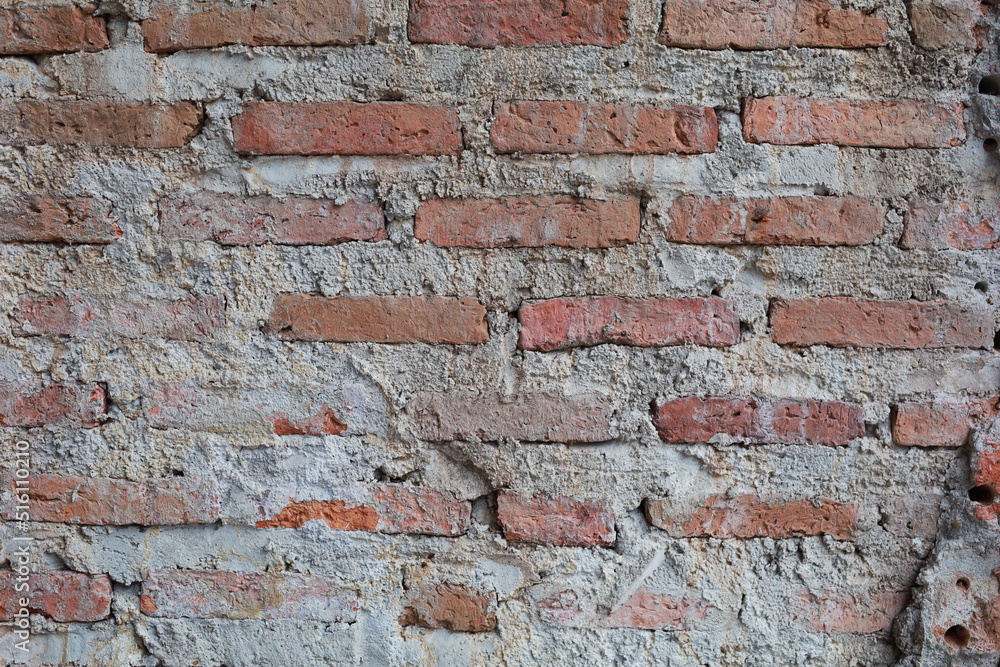 Naklejka premium red brick wall texture unfinished close up