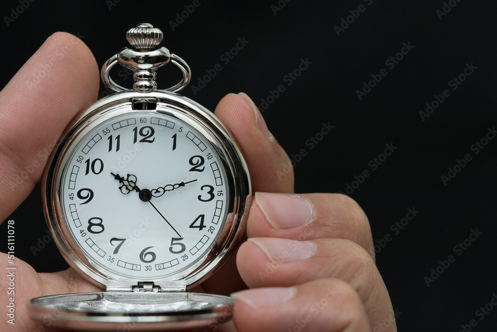 close up of hands with pocket watch retro close up of hands with pocket watch retro