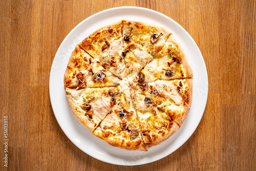 pizza with mushroom on the white plate