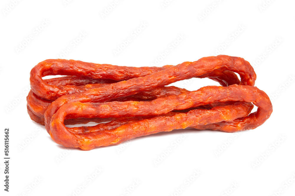 Fototapeta premium Kabanos thin dry sausage for beer delicious isolated on the white background