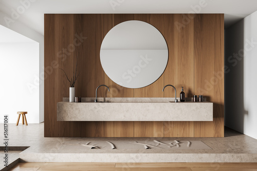 Fotografie Light bathroom interior with washbasin and mirror, accessories on deck