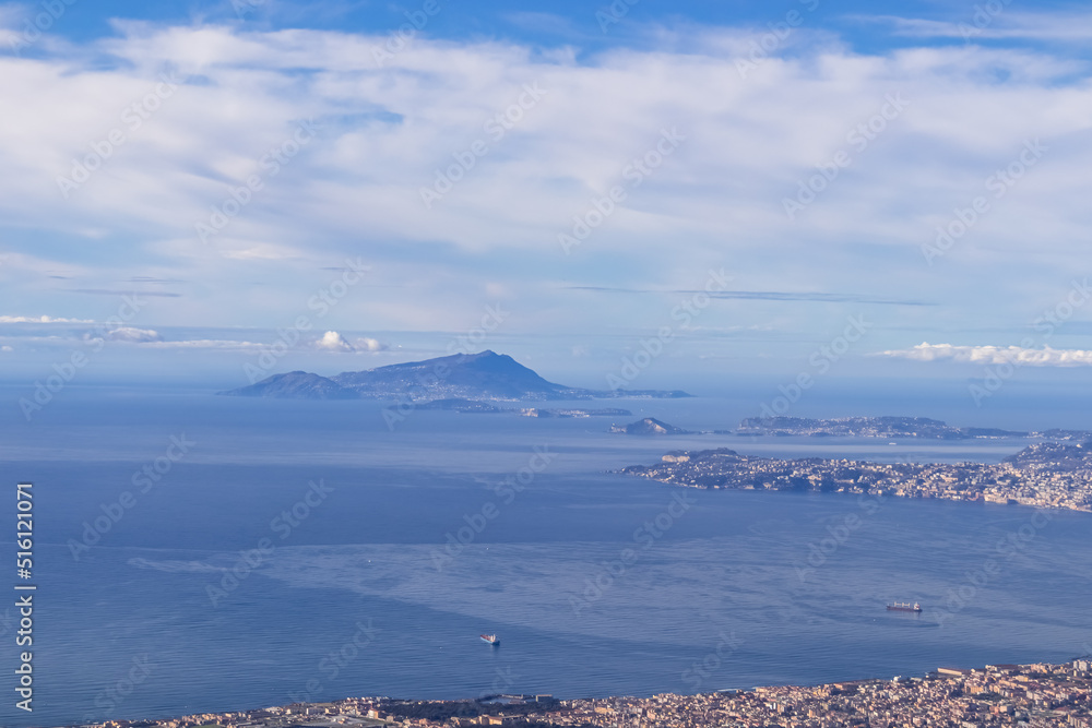 Panoramic view from volcano Mount Vesuvius on the bay of Naples, Province of Naples, Campania region, Italy, Europe, EU. Looking at the city of Naples and Mediterranean coastline on a sunny day.