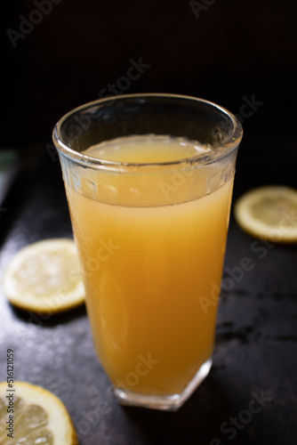 Pineapple juice and lemon slices