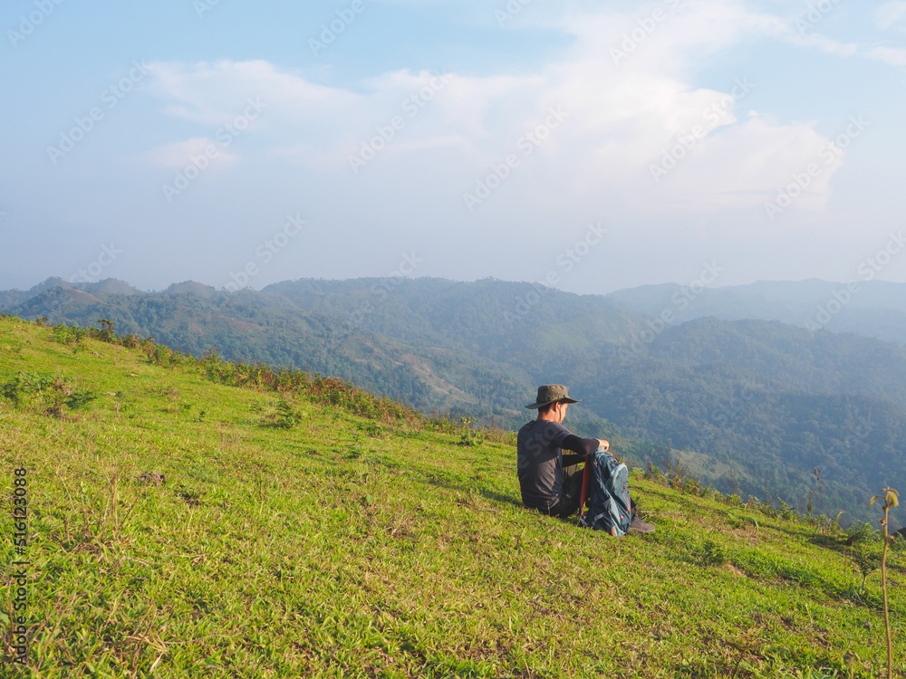 Trekking solo backpack on mountain trail in tropical forest at Tak Province, Thailand. Trekking solo backpack on mountain trail in tropical forest at Tak Province, Thailand.