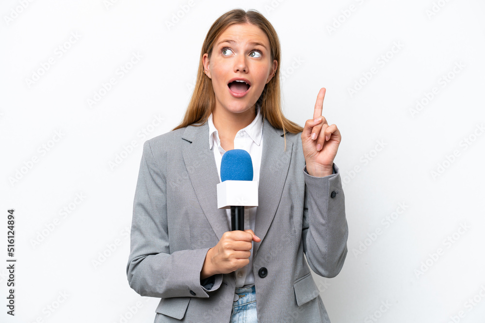 Young caucasian tv presenter woman isolated on white background thinking an idea pointing the finger up Young caucasian tv presenter woman isolated on white background thinking an idea pointing the finger up