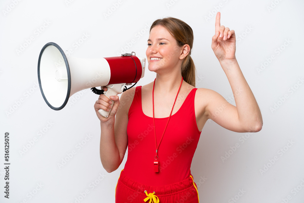 Young caucasian woman isolated on white background with lifeguard equipment and shouting through a megaphone Young caucasian woman isolated on white background with lifeguard equipment and shouting through a megaphone