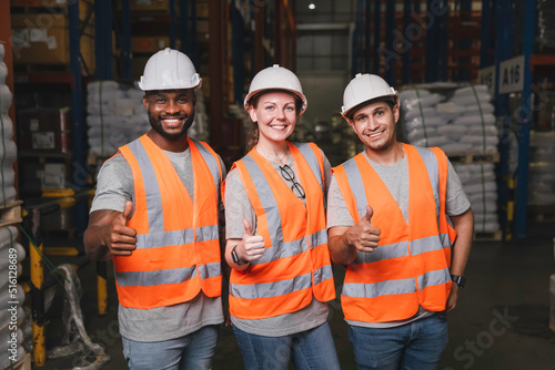 Group worker in safety hat hands together happy celebrate success at warehouse, Logistic inventory teamwork concept