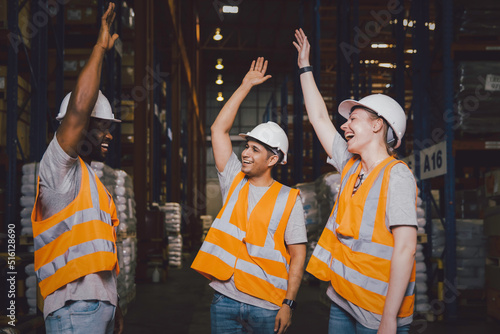 Group worker in safety hat hands together happy celebrate success at warehouse, Logistic inventory teamwork concept