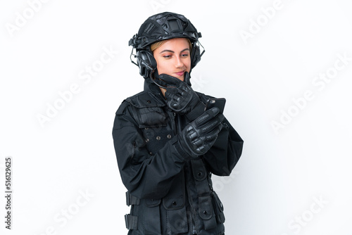 SWAT caucasian woman isolated on white background thinking and sending a message