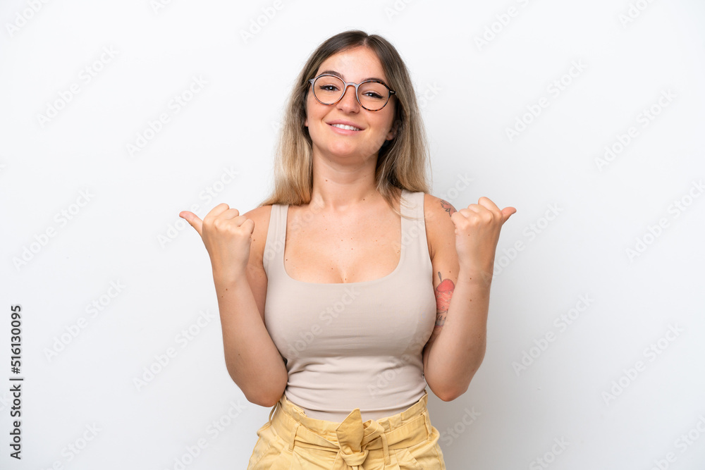 Young Rumanian woman isolated on white background with thumbs up gesture and smiling Young Rumanian woman isolated on white background with thumbs up gesture and smiling