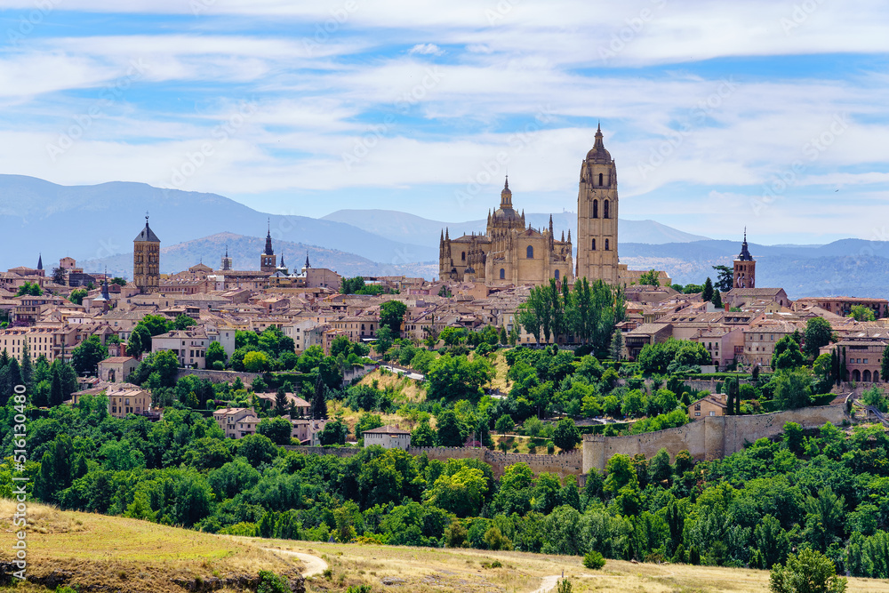 Panoramic view of the city of Segovia with its skyline of old buildings on the hill, Spain. Panoramic view of the city of Segovia with its skyline of old buildings on the hill, Spain.