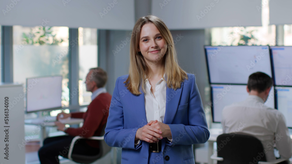 Portrait of happy businesswoman smiling at camera Portrait of happy businesswoman smiling at camera