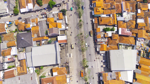 Abstract Defocused Aerial photography Public highway that divides the dense and spacious residential area of Majalaya - Indonesia, Not Focus