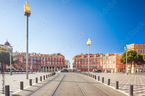 Nice, France - Aug 1, 2021: Tram railroad towards the Fontaine du Soleil on Place Massena photo