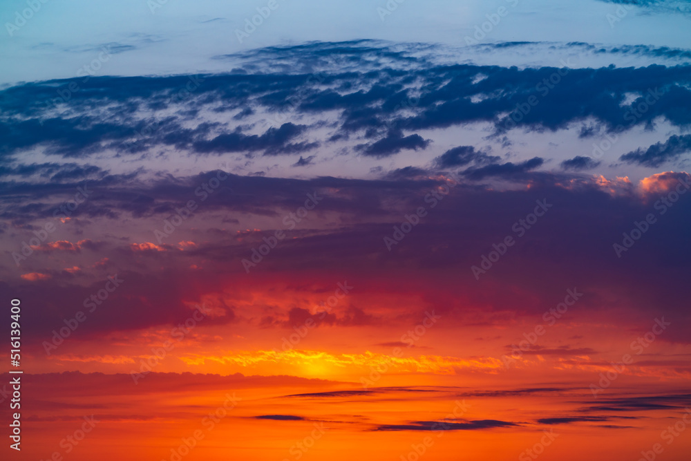 Colorful bright sunset sky background