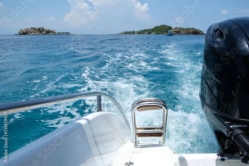 View of the stern of the boat with the waves caused by boat engines