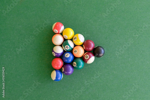 billiard balls on green background