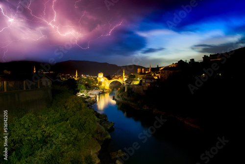 Mostar, Bosnia and Herzegovina. The Old Bridge, Stari Most, with emerald river Neretva photo