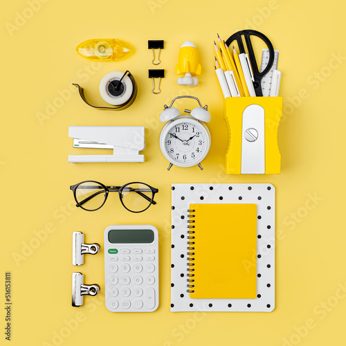 Black and white stationery on yellow background. School stationery supplies. Workplace organization. Concept back to school..