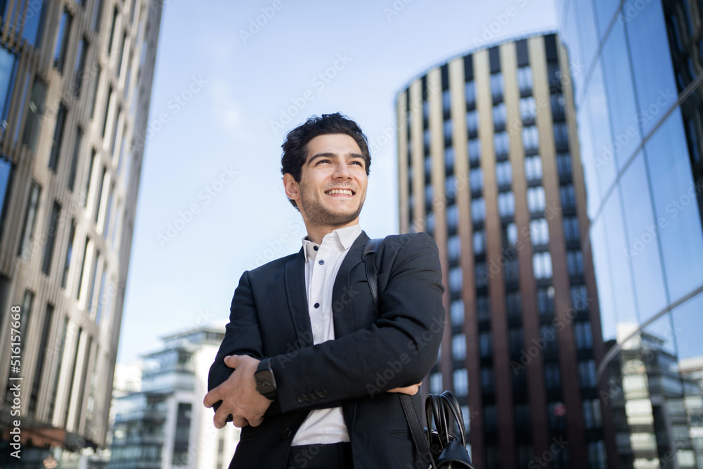 The male receptionist goes to work in the office in a business suit The male receptionist goes to work in the office in a business suit