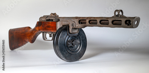 Submachine gun ppsh-41 on a light background. photo