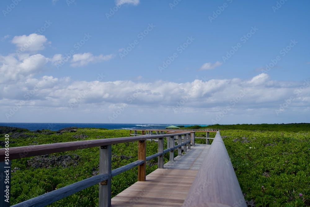 Wood deck road over the rocks and beautiful scenery of Irabu Island