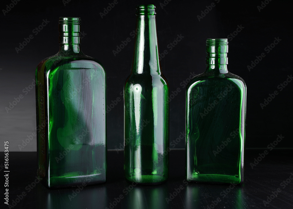 three bottles on black three bottles on black