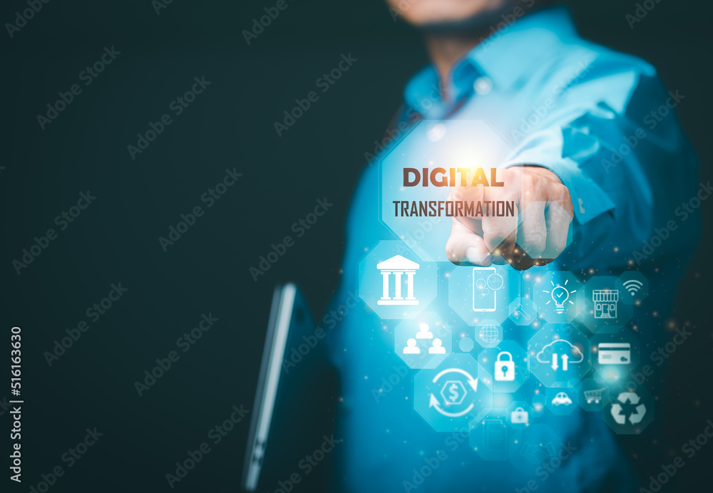 Fototapeta premium young businessman standing and pointing to the icon,