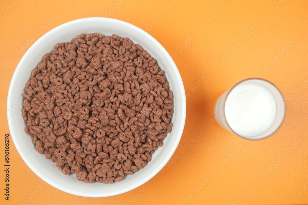 chocolate corn flakes in a bowl on table chocolate corn flakes in a bowl on table