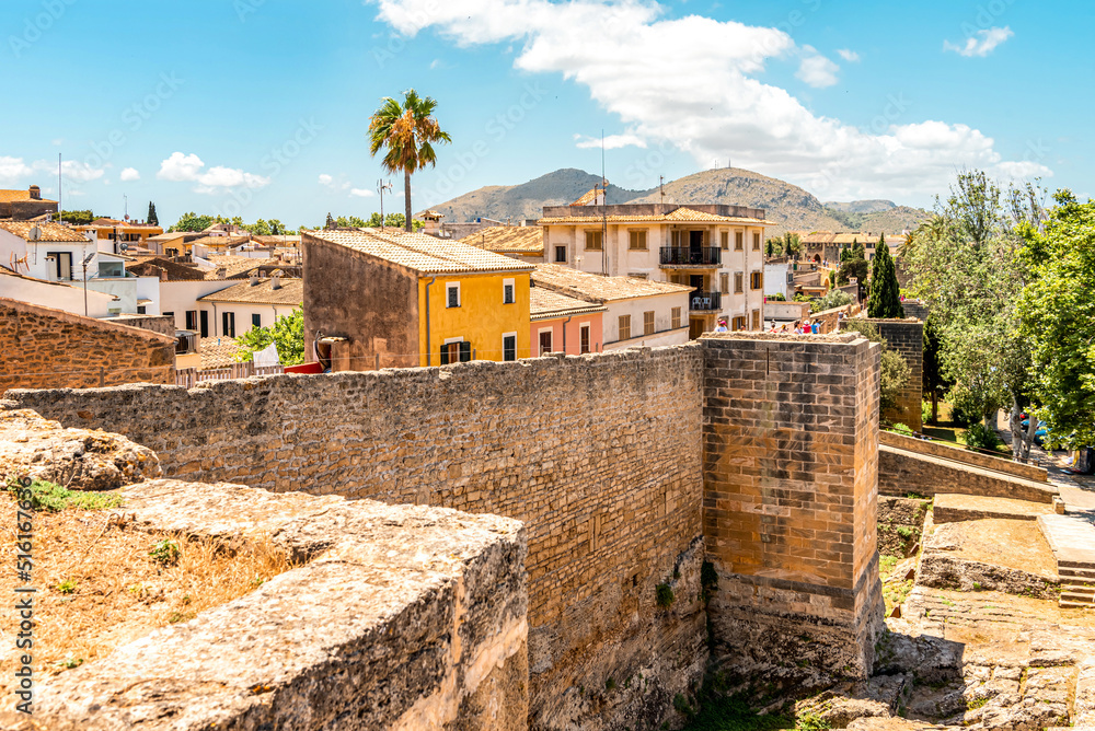 Walls of the Porta del Moll fortress in the old town of Alcudia, Mallorca island