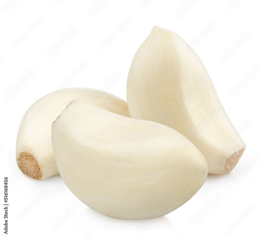 Three delicious garlic cloves, isolated on white background Three delicious garlic cloves, isolated on white background
