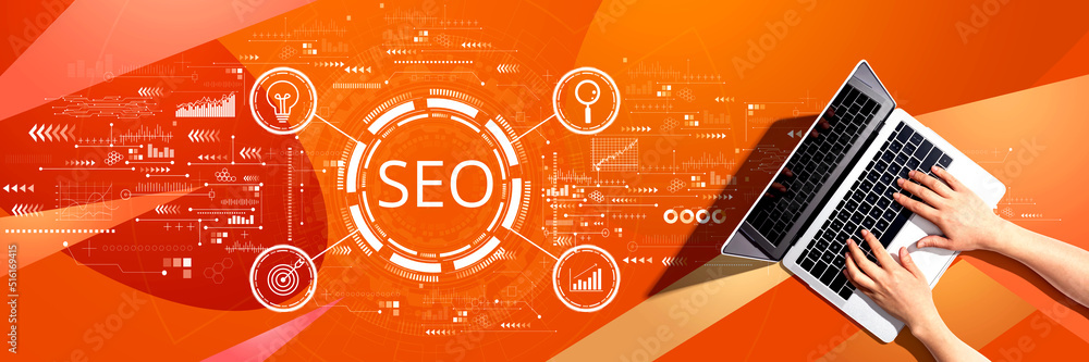 SEO concept with person using a laptop computer SEO concept with person using a laptop computer