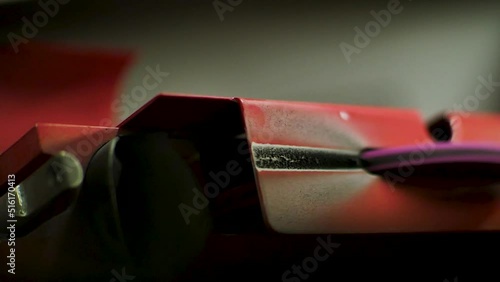 hockey skates. sharpening the blade of a shoe close-up. sport. hockey. blade sharpening sparks