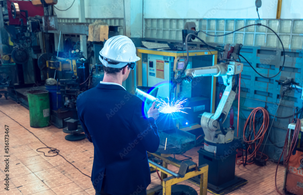 senior engineer In progress to control the robotic arm to do the welding of the workpiece. with resolution and high accuracy requirements by tablet to obtain workpieces used in the automotive industry senior engineer In progress to control the robotic arm to do the welding of the workpiece. with resolution and high accuracy requirements by tablet to obtain workpieces used in the automotive industry