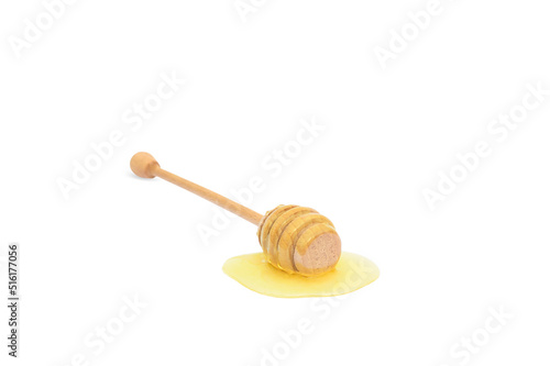 Honey stick isolate in honey drop in horizontal position