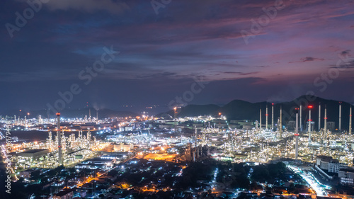 Aerial view of twilight oil refinery and factory Petrochemical plant blue sky background 