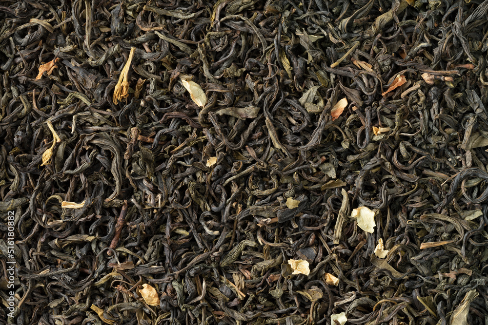 Dried Chinese Jasmine tea leaves close up full frame