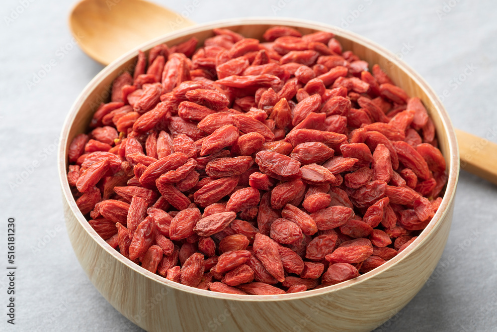 Dried goji berries or wolfberries in a bowl close up Dried goji berries or wolfberries in a bowl close up